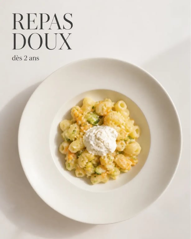Recette rapide bébé 2 ans de coquillettes fondantes aux légumes écrasés sur assiette simple